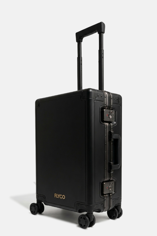 FLYCO black aluminium luggage — three-quarter view