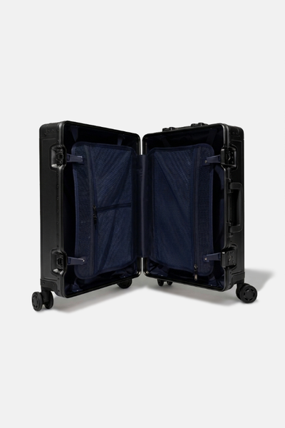 FLYCO black aluminium luggage — open, angled view